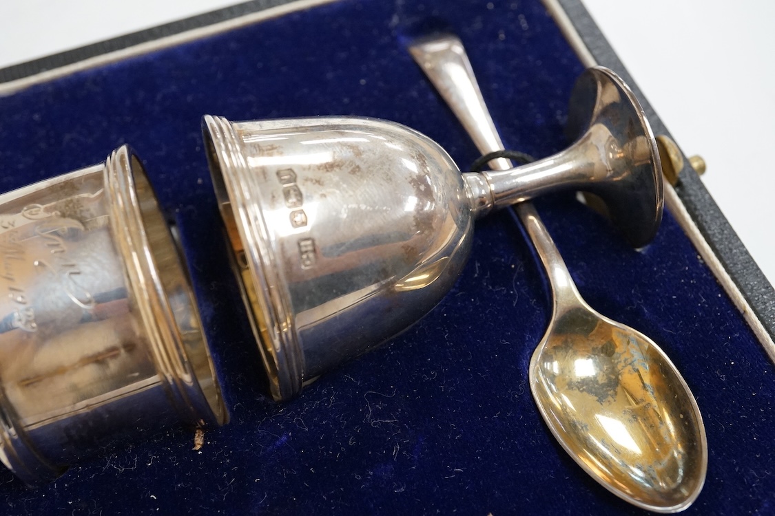 Three assorted silver christening sets including spoon, fork and napkin ring by William Hutton & Sons, London, 1896, one other set with steel knife, two cased sets of silver coffee spoons and a cased set of six Japanese